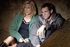 Jim Carrey and Tea Leoni as Dick and Jane