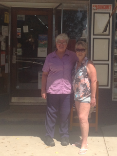 Gayle in her short shorts at her country store photo IMG_5636.png