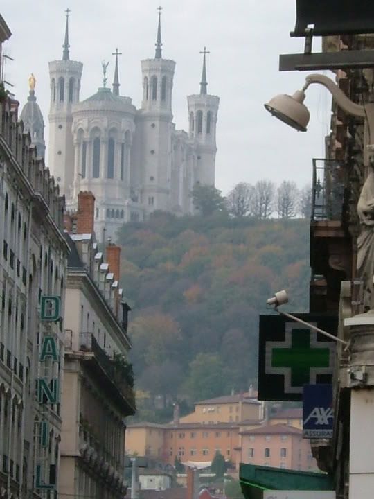 A hazy image (partly due to digital zooming) of N.D.of Fourvière from city center Pictures, Images and Photos