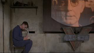 Winston Smith writing in his diary. From the movie 1984(c)