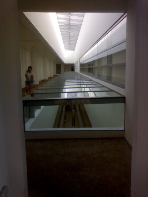 On the bridge of cool building. Itu... cousin =.= What she doing in there?